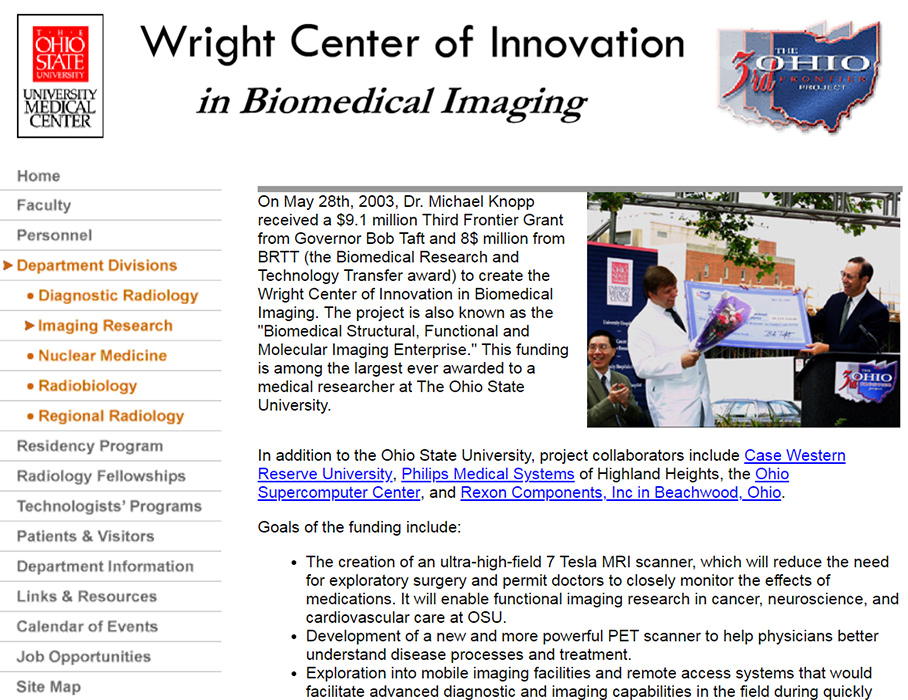 Dr. Michael Knopp receiving award for grant for Wright Center of Innovation